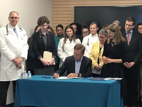 Governor Lamont signing healthcare benchmark executive order