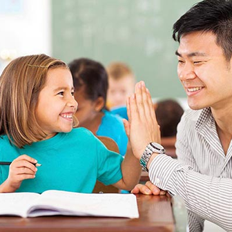 Image of student and her teacher